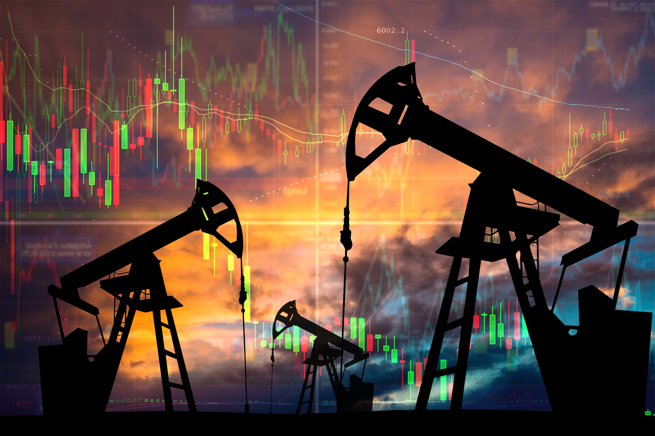 Oil pump with candle stick graph chart in the background. World Oil Industry